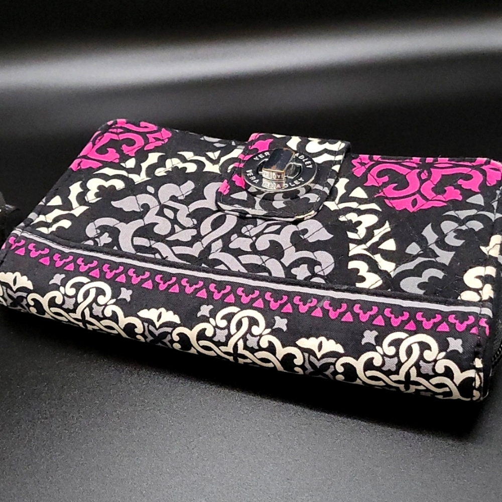 Quilted Floral print and Magenta Vera Bradley checkbook style wallet.